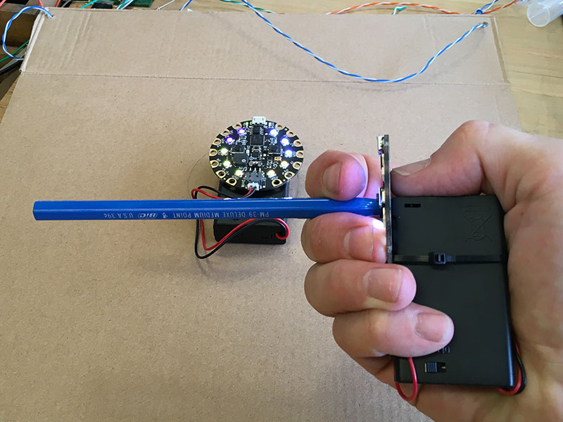 Simply place the barrel over the TX LED