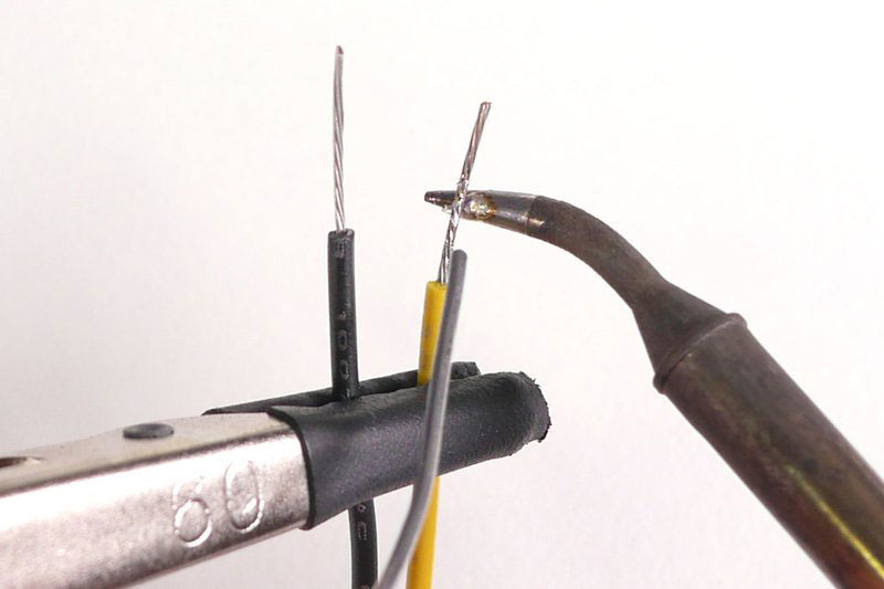 Strip 1/4 inch of insulation off the ends of each wire