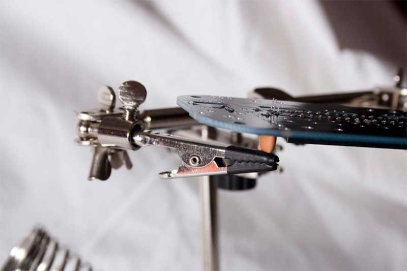 Now add the ceramic oscillator, Y1